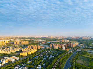 Fototapeta premium aerial view of urban scenery in the suburbs at sunset, Shanghai.