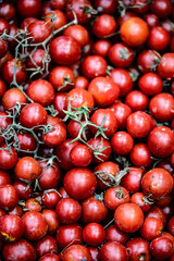 Cluster of Fresh Cherry Tomatoes – Vibrant Red Color and Natural Texture
