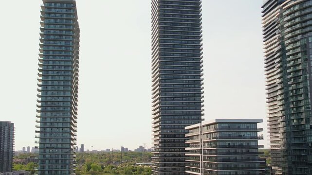 Aerial view of waterscapes condos at Marine Parade Drive near Humber Bay Park and close to the Ontario lakefront in Etobicoke. Mimico scenic waterfront parks for leisure and fishing. Toronto West.