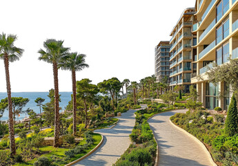 Coastal resort path winding through lush gardens, modern buildings in background