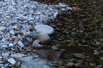 shore of the river with pebbles 