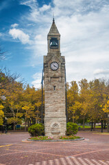 centerway square clock tower in corning new york in autumn