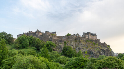 Edinburgh Castle Scotland - Princes Gardens Spring atmosphere on a cloudy day.