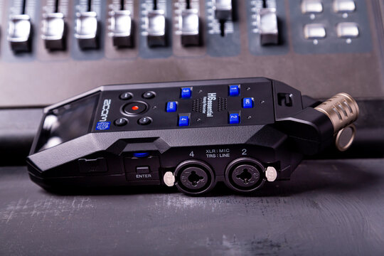 illustrative editorial materials, zoom h6 essential sound recorder on a gray background at the sound console