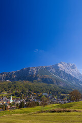 Sappada village under the imposing Mount Peralba in the Dolomites, Italy