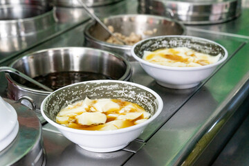 A delicious bowl of soft tofu pudding, known as 