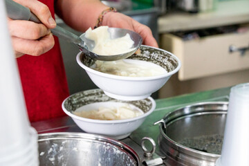 A delicious bowl of soft tofu pudding, known as 