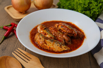 Mackerel in Tomato Sauce with chilli,canned fish,Tinned fish in a white plate	