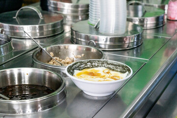 A delicious bowl of soft tofu pudding, known as 