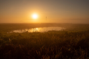 Autumn nature. Landscape with sunrise over the river on an autumn morning.
