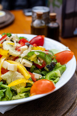 Colorful Greek salad on plate