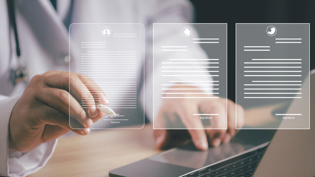Electronic signature or E-sign concept document management for business.Medical worker sign electronic documents on digital documents, paperless office, future business contract signing