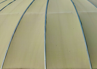 Close-Up of Yellow Awning Structure