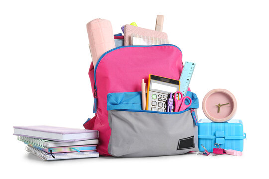 Alarm clock, school backpack with stationery isolated on white background - Powered by Adobe