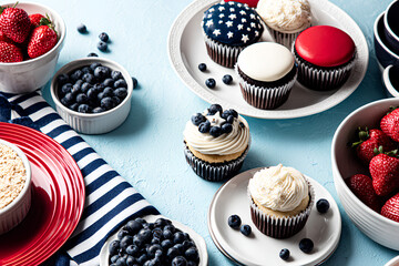 4th of July cupcakes and desserts decorated in national colors, red, blue and white.