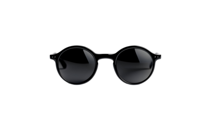 Minimalist elegance: A pair of round black sunglasses against a dark background
