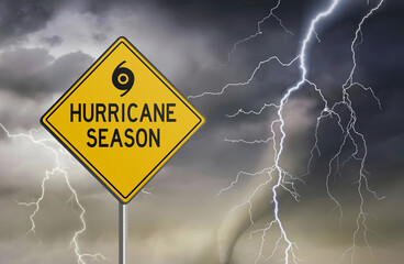 Hurricane season sign on storm sky background
