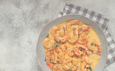 shrimp in creamy garlic sauce, with spices and herbs,