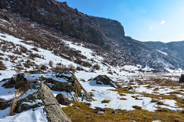 rocks and snow in Hrazdan river valley near Bjni village (Kotayk province, Armenia)