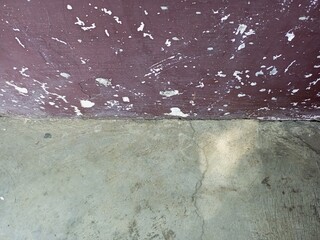 Distressed Wall with Peeling Paint and Concrete Floor