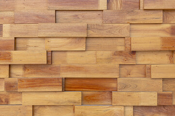 Natural wooden wall texture background with overlapping rectangular wood planks, rustic surface design, warm brown tones, timber panel pattern for interior or exterior decoration, isolated full frame