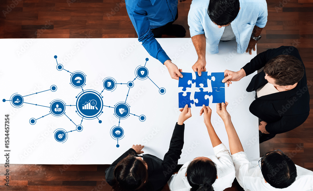 Aufkleber A top-down view of a business team collaboratively solving a puzzle on a table, surrounded by data icons and graphic elements representing management strategies. Amity