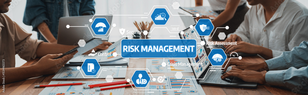Poster A diverse team engaged in a risk management strategy session, analyzing data and discussing solutions to enhance assessment and control within their organization. Amity