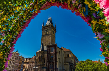 A flower shrouded view southwest from the centre of the old town square in central Prague in springtime