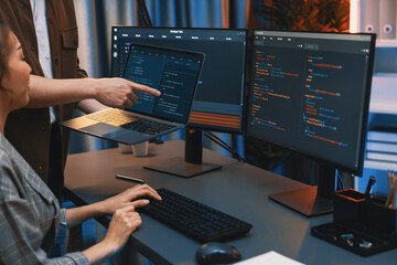 Serious of IT developers discussing intelligent website development coder system running data...