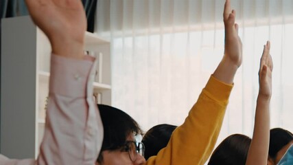 Group of interviewee candidate in colorful casual wearing line up for vacancy interview sitting on the chair. Intern raise hand. Job opportunity recruitment for HR agency and vacancy concept. Synergic