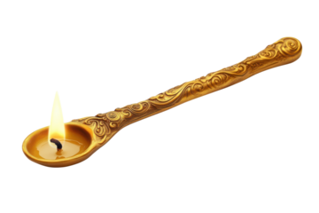 A golden spoon cradles a bright candle flame illuminating ancient traditions hope and silent on transparent background