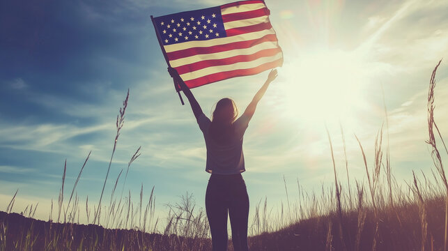 United states flag. The United States flag waves proudly on a flagpole against a bright blue sky