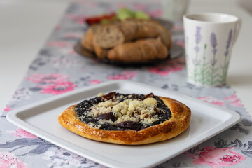 Tasty breakfast. Poppy seed cake and tea