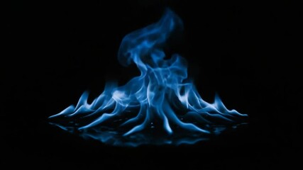 Abstract blue fire flames burning brightly against a dark backdrop for special effects