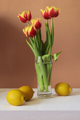 Still life with tulips and lemons
