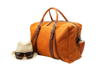 Pack and go: orange duffel travel bag with brown leather details, sun hat, and sunglasses on isolated white or transparent PNG