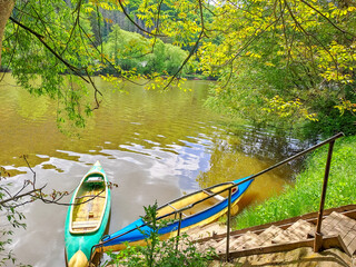 Beautiful views of the river Berounka a Wooden boats in the spring season. Czech