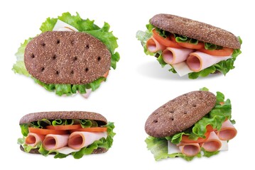 Ham cheese tomato rye sandwich on a white isolated background