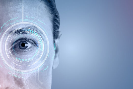 Human eye with digital biometric scanning interface and futuristic HUD elements for secure identity verification on blue background concept.