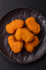 Chicken nuggets in breading, takeaway food, junk food