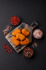 Chicken nuggets in breading, takeaway food, junk food