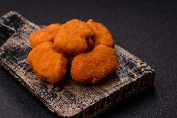 Chicken nuggets in breading, takeaway food, junk food
