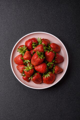 Strawberry, fresh juicy berries and fruits as background