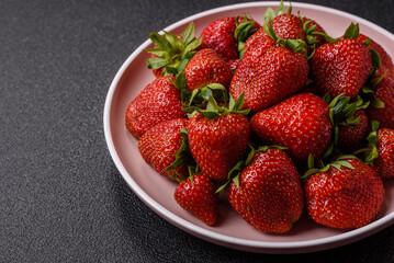 Strawberry, fresh juicy berries and fruits as background