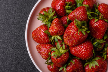 Strawberry, fresh juicy berries and fruits as background
