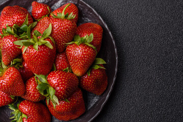 Strawberry, fresh juicy berries and fruits as background