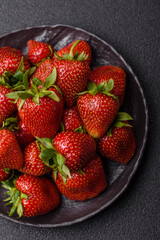 Strawberry, fresh juicy berries and fruits as background