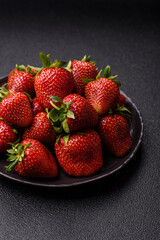 Strawberry, fresh juicy berries and fruits as background
