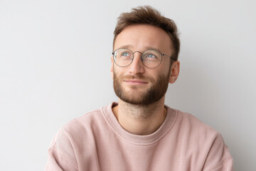 Obraz premium portrait of web developer deep in thought with focused expression