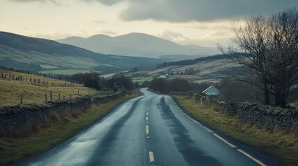 Winding road through a valley landscape